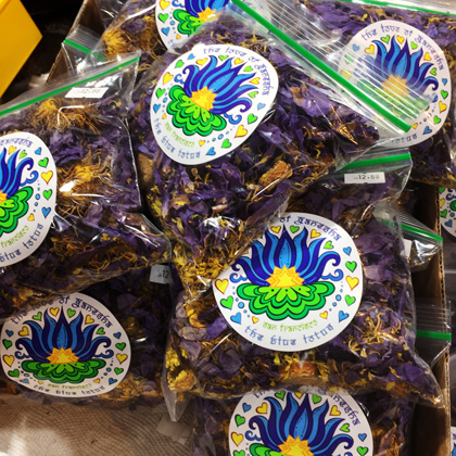 Blue lotus stickers on bags